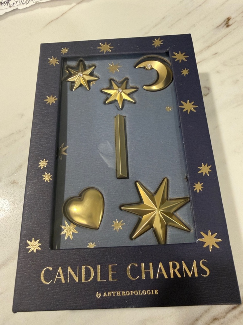 Anthropologie gold I candle charm
